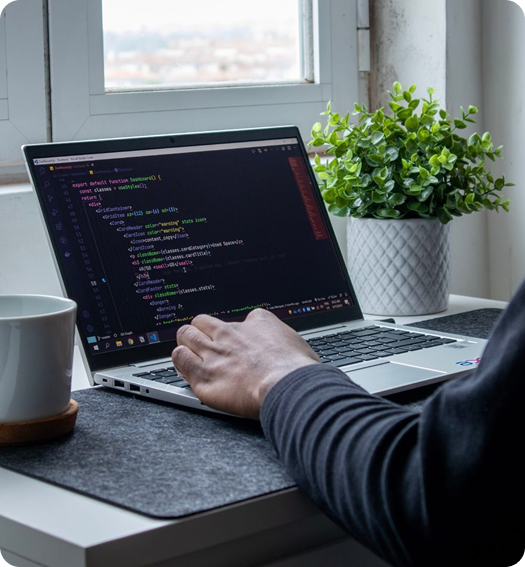 Developer coding on laptop